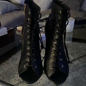 Steve Madden gently worn peep toe booties.